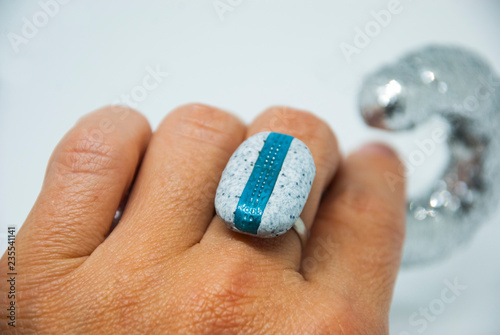 Winter handmade jewelry. Turquoise, grey and silver abstract modern woman ring. Fashion jewellery.