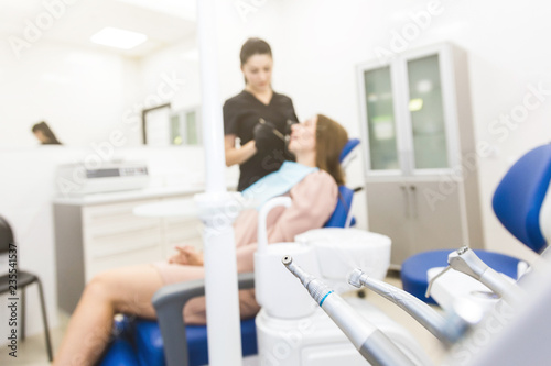 Dental clinic. Reception, examination of the patient. Teeth care. Modern dental equipment.