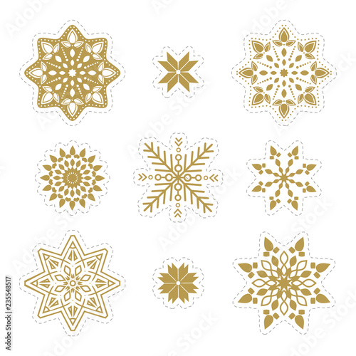 Set of snowflakes. Beautiful winter ornament. Collection of stickers of snowflakes to cut out. Christmas paper Icons