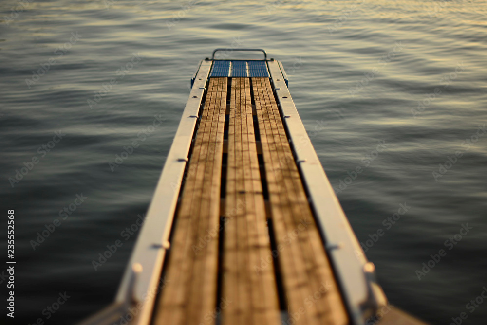 Floating pier on calm water Floating pier on calm water