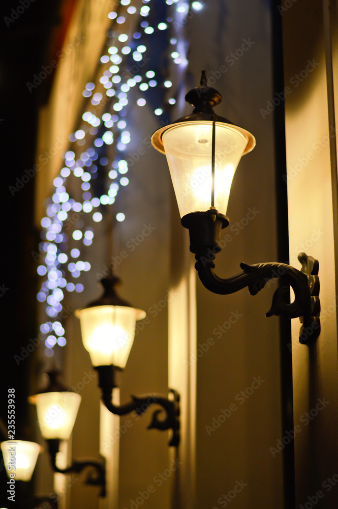 lantern, lamp and christmas blue garland in night city
