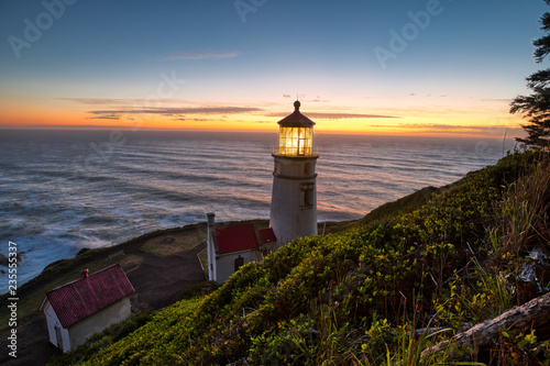 Haceta Lighthouse at Sunset photo