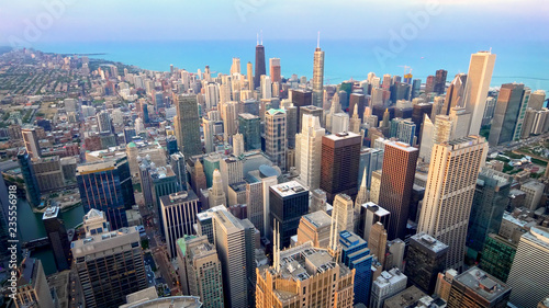 Aerial View of Chicago City Skyline and Lake Michigan  logos blurred 