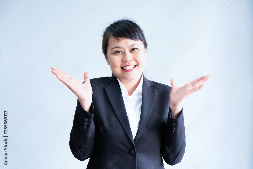 Beautiful young businesswoman standing smiling on white background. Beautiful young businesswoman standing smiling on white background.