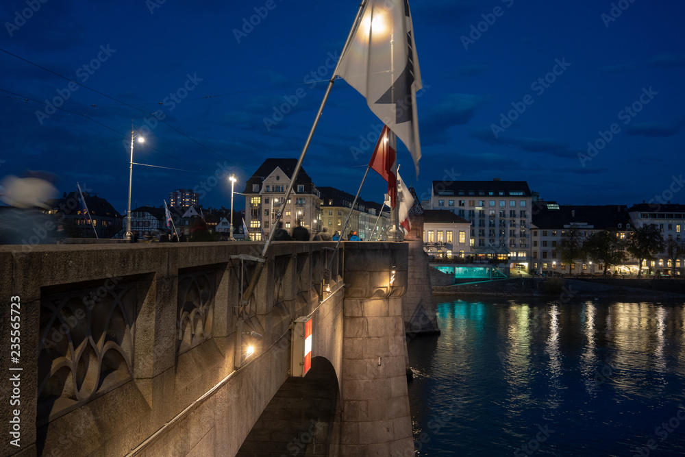 Switzerland, Basel at night light. The city is known for its many internationally renowned museums, ranging from the Kunstmuseum, the first collection of art accessible to the public in Europe (1661) 