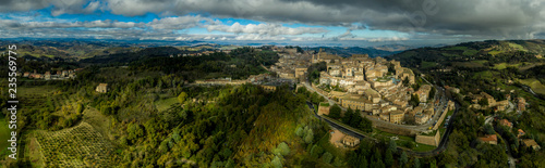 Aerial panorama of the Ducal Palace at the popular tourist destination world heritage site of Urbino in the Marche region Italy
