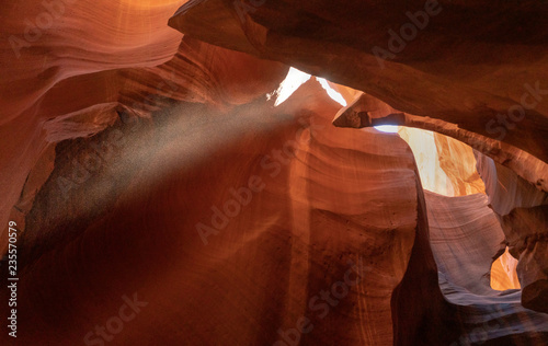 A sunlight shining in the upper antelope cave enhance by sand particle, Arizona, USA