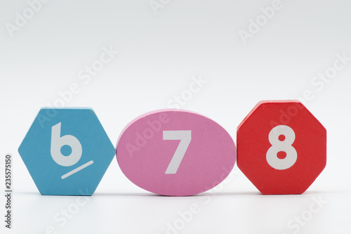 Numbers six to eight on wooden shapes
