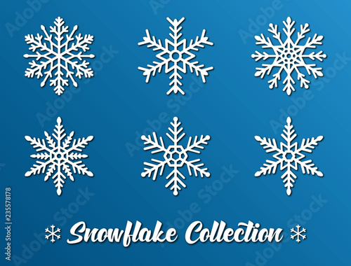 White snowflake collection on light blue background