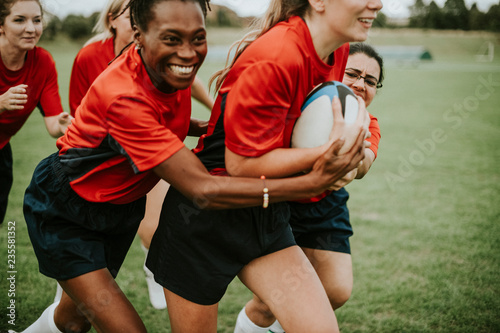 Women playing rugby