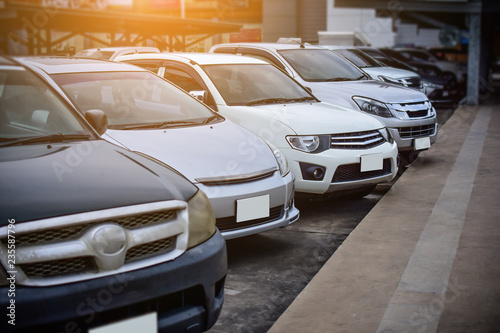 Car parked on road,Car driving on road © Suriyo