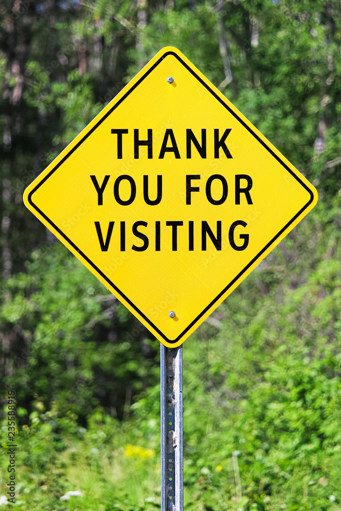 Closeup of a thank you for visiting sign