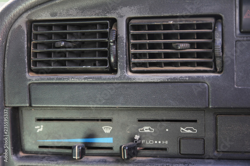 Close up dirty dust air condition vent channel in the old car. full of dust. dirty car air vent concept. © NopponPAT