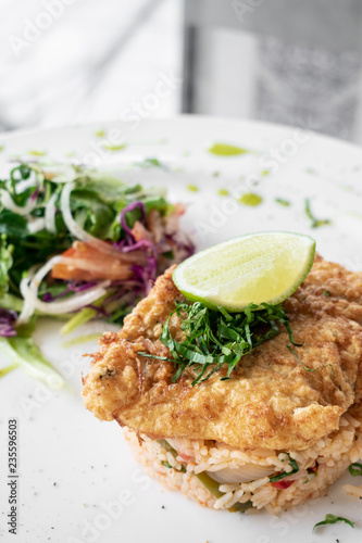Fototapeta Naklejka Na Ścianę i Meble -  fresh fried battered cod fish fillet summer light lunch meal