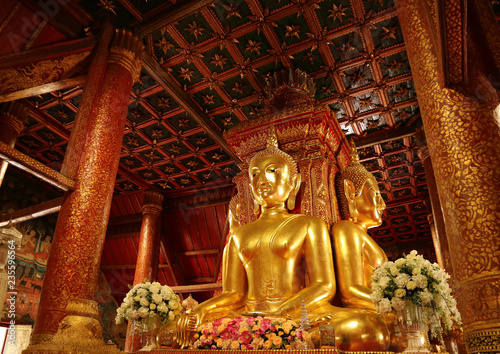 Unique and Gorgeous Golden Four-sided Seated Buddha Images of Wat Phumin Temple, Famous Buddhist Temple in Nan Province, Thailand 