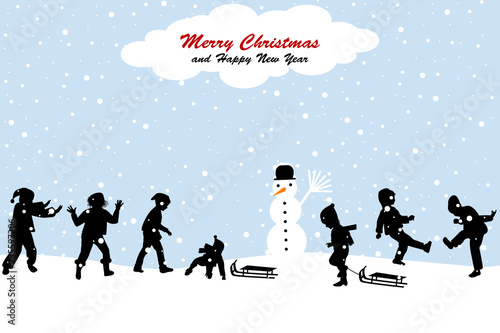 Christmas scene with a kids having fun in the snow