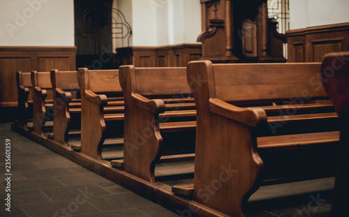 Fotografía Rows of church benches. Selective focus.