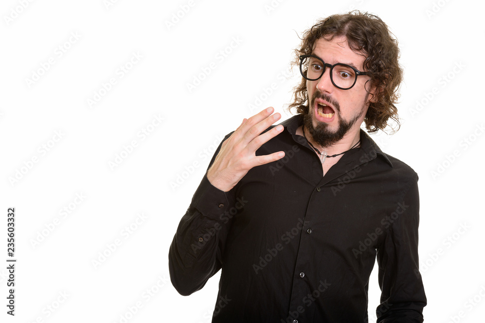 Handsome Caucasian man looking shocked and surprised Handsome Caucasian man looking shocked and surprised