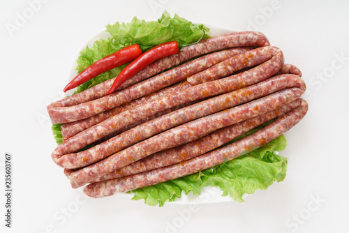 raw sausages with chilli pepper