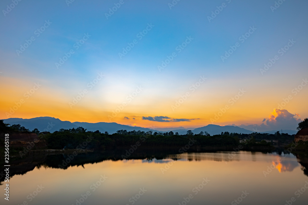 Bright Colorful Sunrise On The Lake