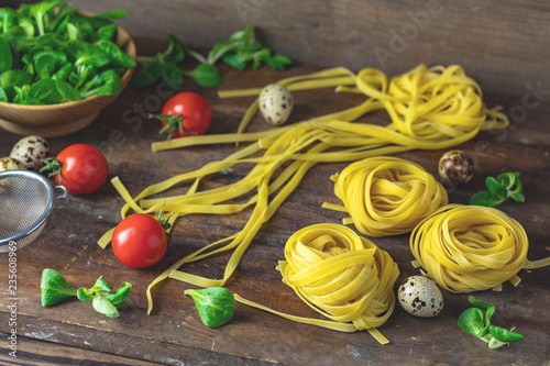 Raw homemade Italian typical pasta linguine noodles