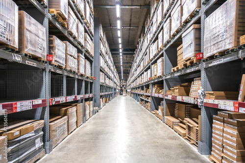 Background of virtual coke in shelves of large cargo warehouses photo