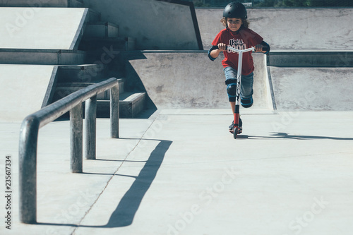Young boy having fun in the skate park