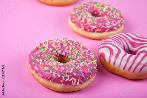 Donuts  on a pink background.