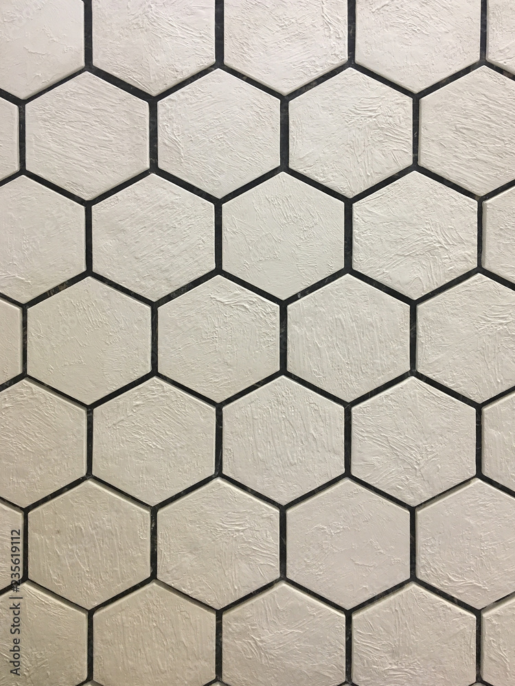 Artificial stone. Decorative wall of artificial torn stone. Stone masonry in geometric pattern as background or texture. Artificial stone. Decorative wall of artificial torn stone. Stone masonry in geometric pattern as background or texture.