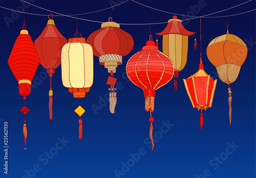 Decorative background with Chinese red paper street lanterns of various shape...