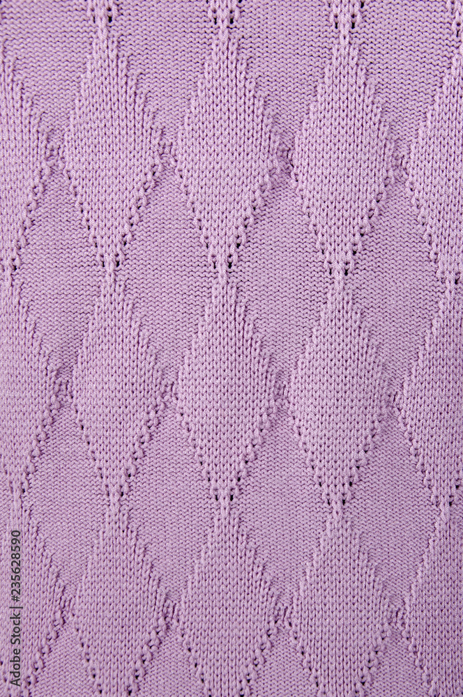 piece of knitted sweater with a simple pattern piece of knitted sweater with a simple pattern