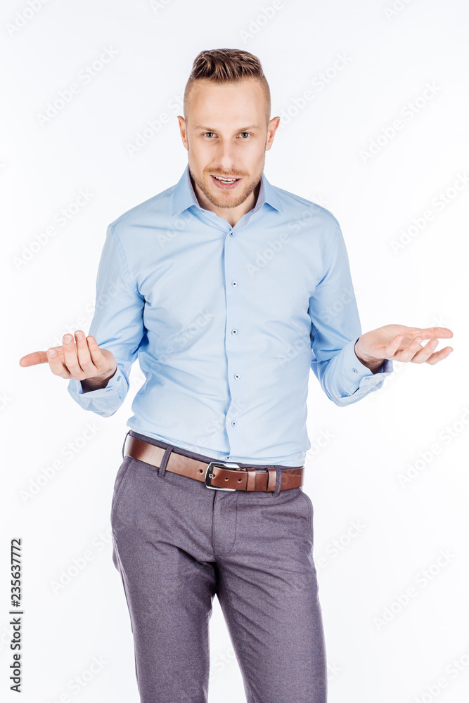 Man on a white studio background. emotions and people concept.