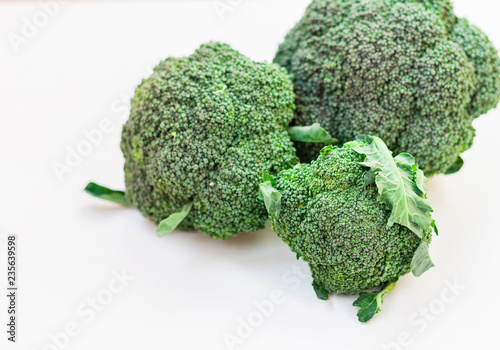 Broccoli inflorescence on white background isolated with space for text