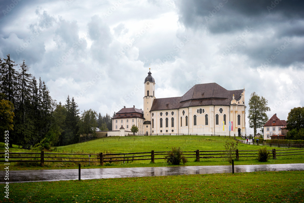 Pilgrimage Church of Wies, on a rainy day - Wieskirche at Steingaden on the romantic road in Bavaria, Germany