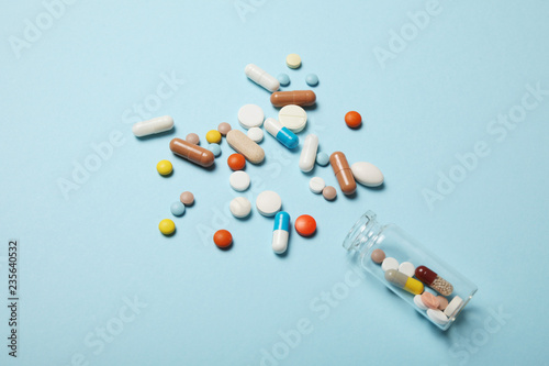 Aches and pains concept, medicine background. Pharmacy vitamins in pill.