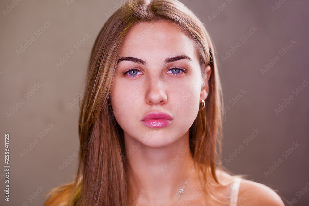 Naklejka premium Young blonde woman without makeup