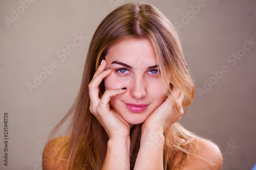 Young blonde woman without makeup