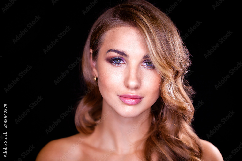 Beautiful young model with blonde hair and perfect makeup Beautiful young model with blonde hair and perfect makeup