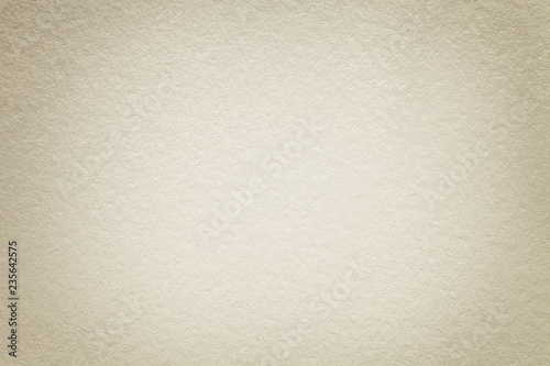 Texture of old dark white paper background, closeup. Structure of dense emerald cardboard.