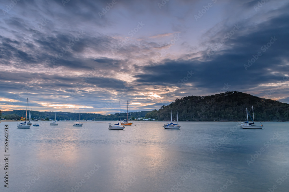Cloudy Dawn on the Bay with Boats