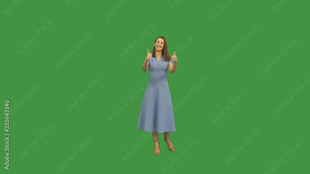 young woman show two thumb on green screen young woman show two thumb on green screen