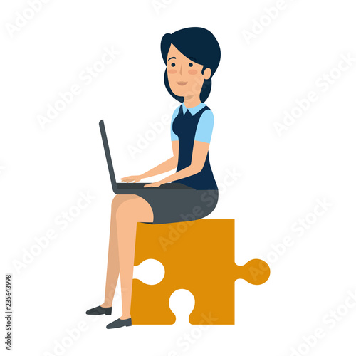 businesswoman sitting in puzzle piece with laptop