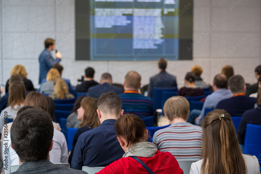 Obraz premium People attend business conference in the congress hall