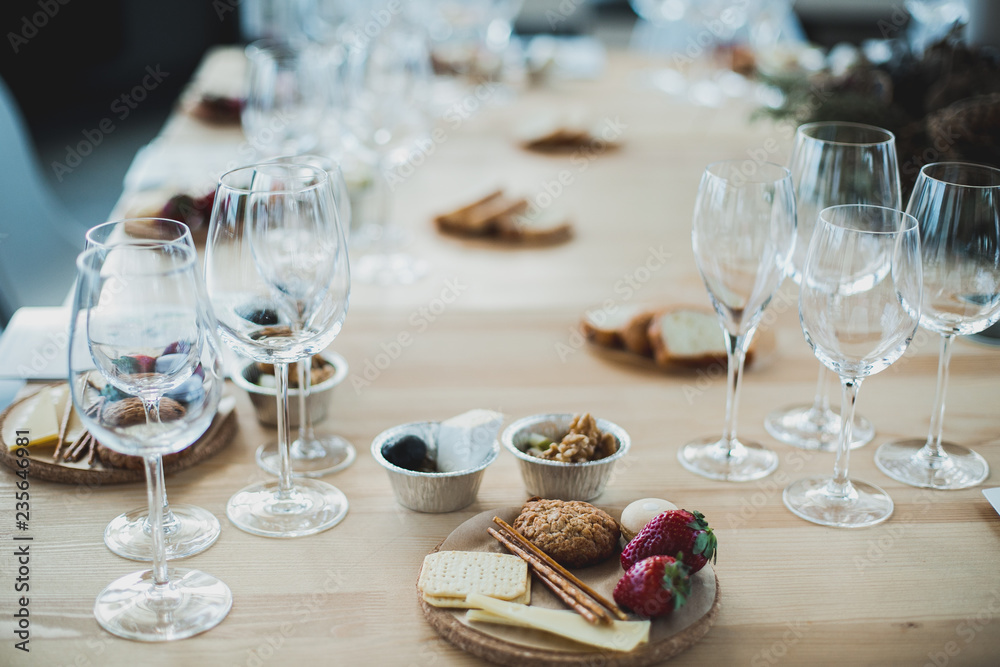 Table setting with wine and snacks, etiquette and event