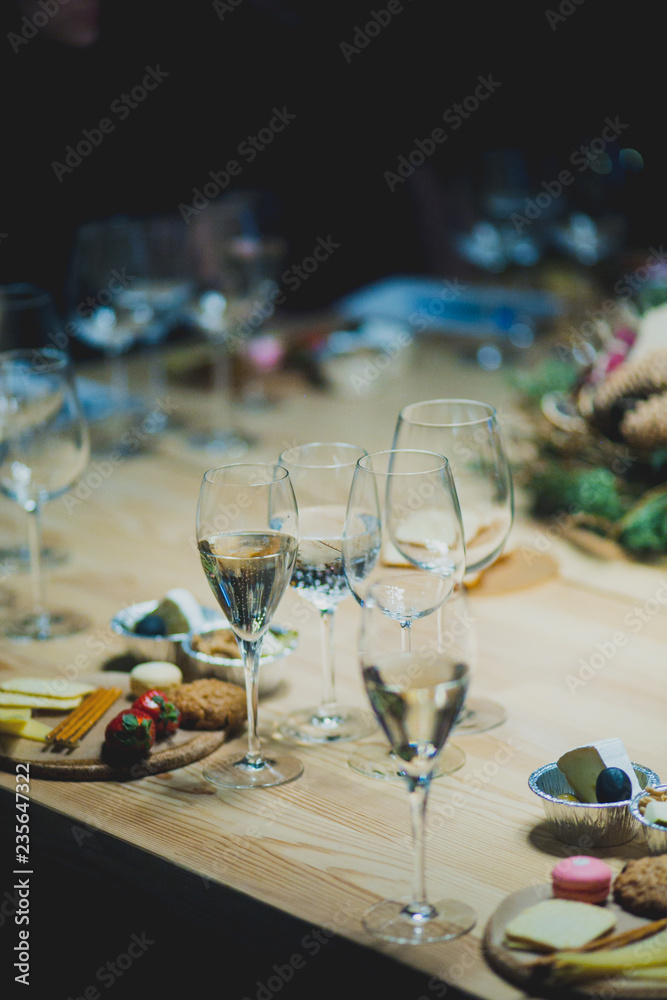 Table setting with wine and snacks, etiquette and event