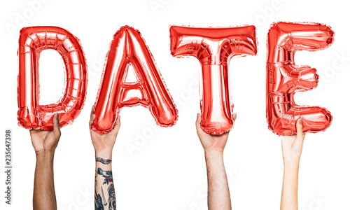 Red alphabet balloons forming the word date