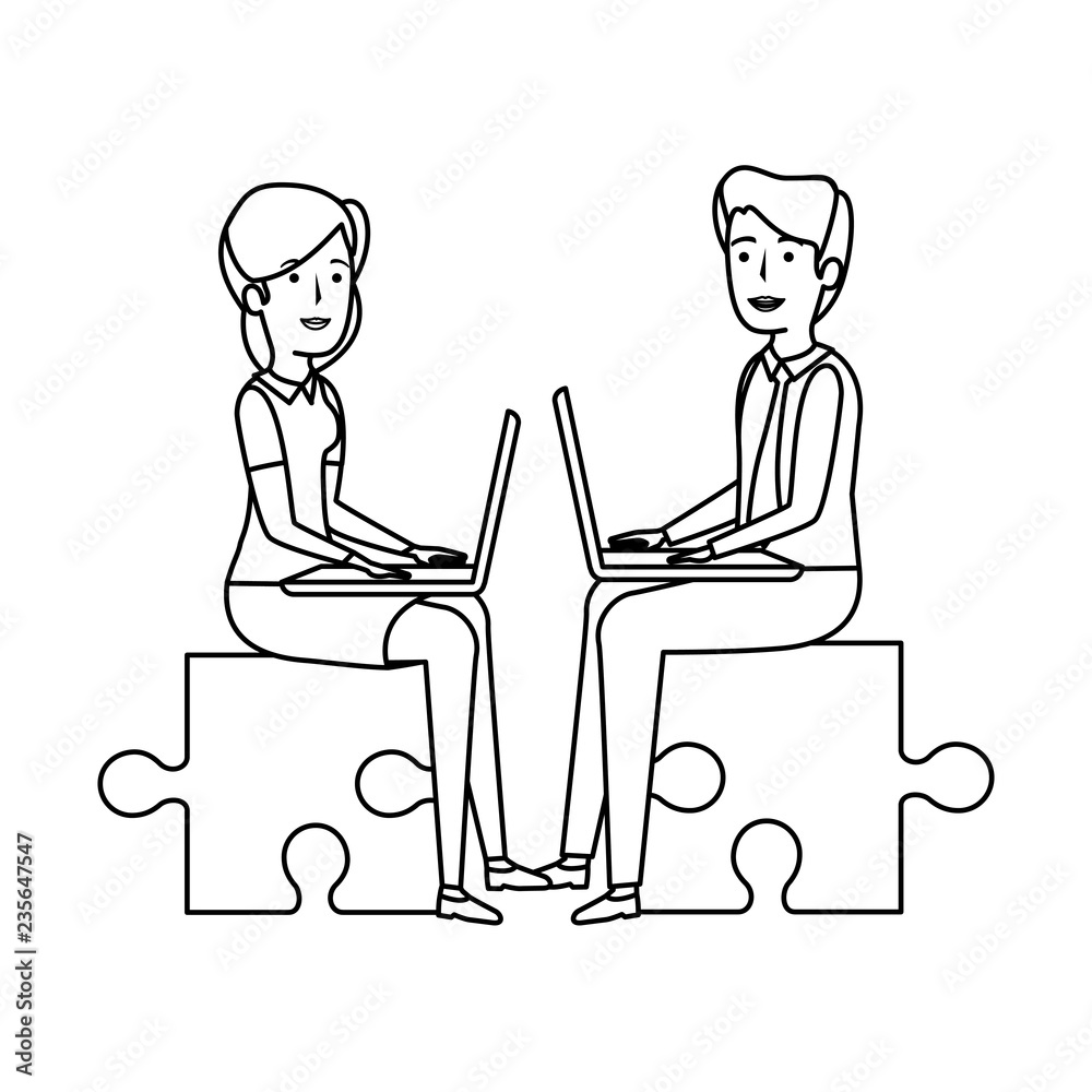 business couple sitting in puzzle piece with laptop