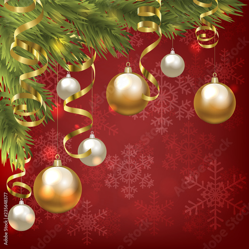 Christmas baubles and golden serpentine streamers. Christmas card