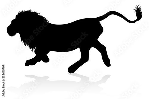Fototapeta Naklejka Na Ścianę i Meble -  A male lion safari animal in silhouette