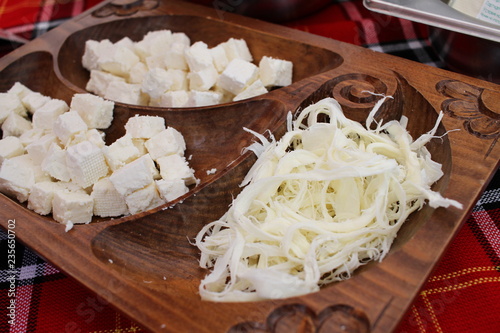 White brine cheese and yellow kashkaval from cow, goat or sheep milk  photo